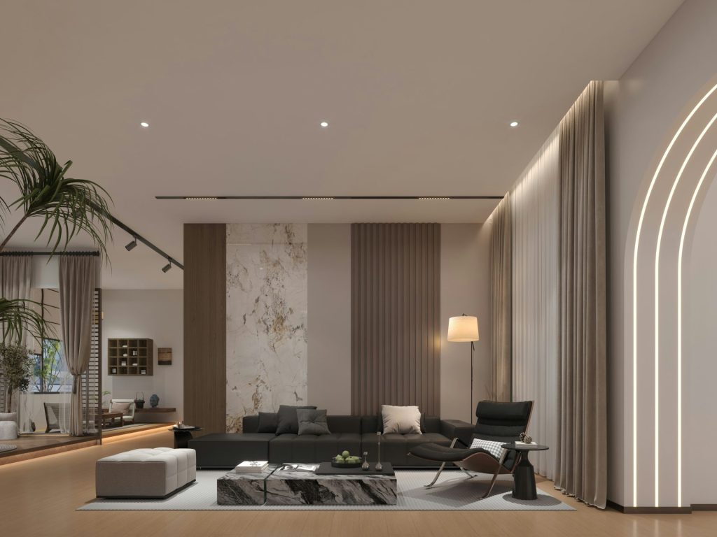 Salón moderno con muebles elegantes e iluminación ambiental.